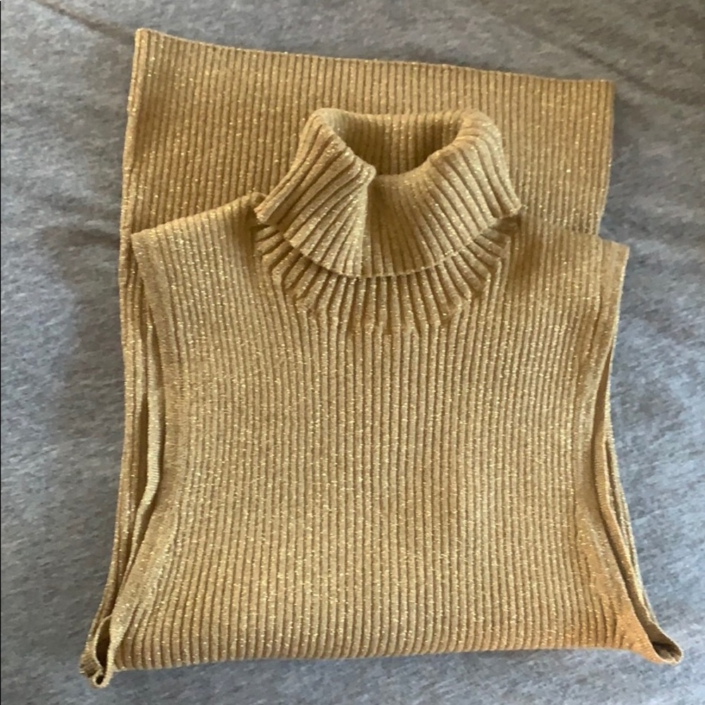 Gold sleeveless turtleneck sweater